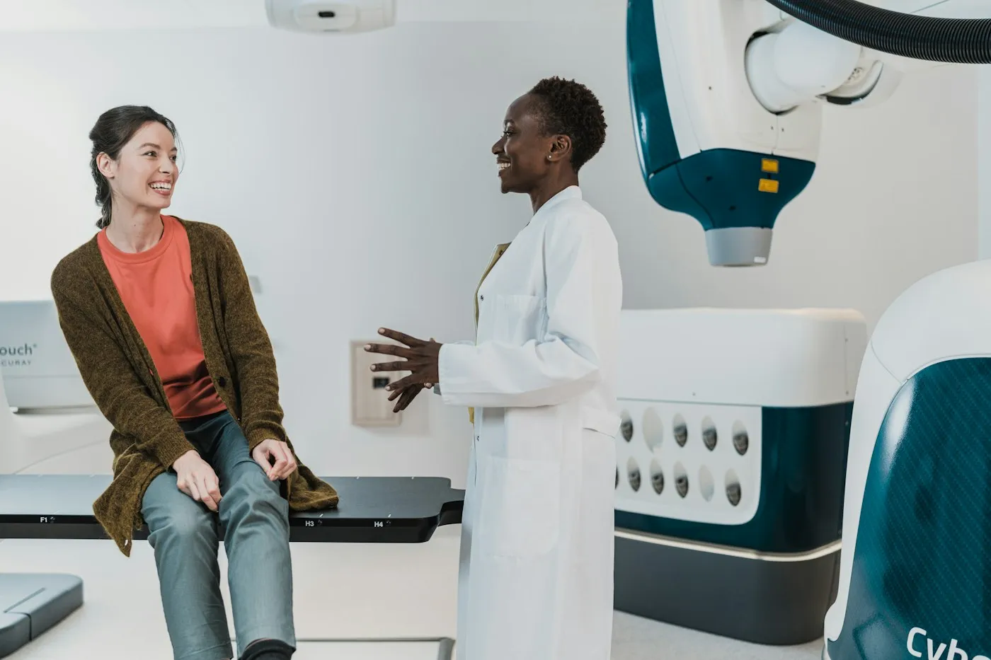 Clinician talking with a patient in a private clinic