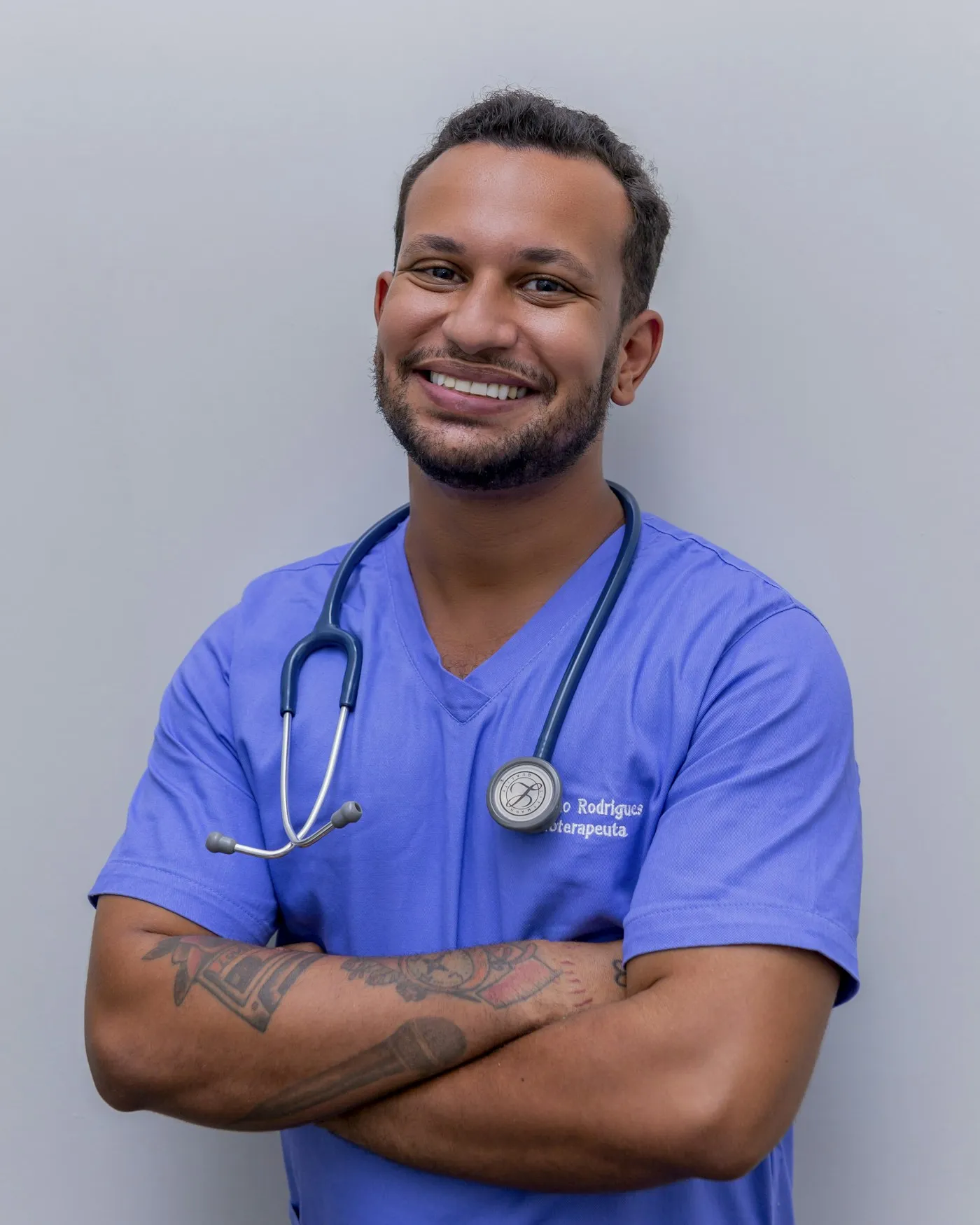 Nurse in blue scrubs with a stethoscope